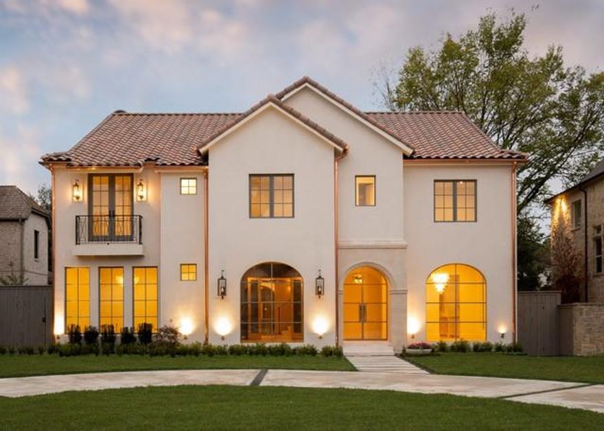 Discover timeless elegance in this Prous Homes Mediterranean estate featuring premium finishes and an indoor-outdoor layout made for entertaining. A grand foyer leads past a large dining room, study and powder room to the remarkable great room flanked by a bar and fireplace. The gourmet kitchen shines with custom cabinetry and upscale appliances. Relax on the covered patio featuring an adjacent bath. A mudroom, two-car garage and guest-suite complete the level. Above, the gorgeous owner's suite includes a spa bath, two walk-ins and a fitness room. Three secondary suites are joined by a massive game room, half bath and laundry room. A skylit, top-floor studio boasts a bath and attic access. Elevator-ready. Outstanding University Park fairway location. 
All interior photos will be posted on Tuesday Nov, 29.  Please check back then!