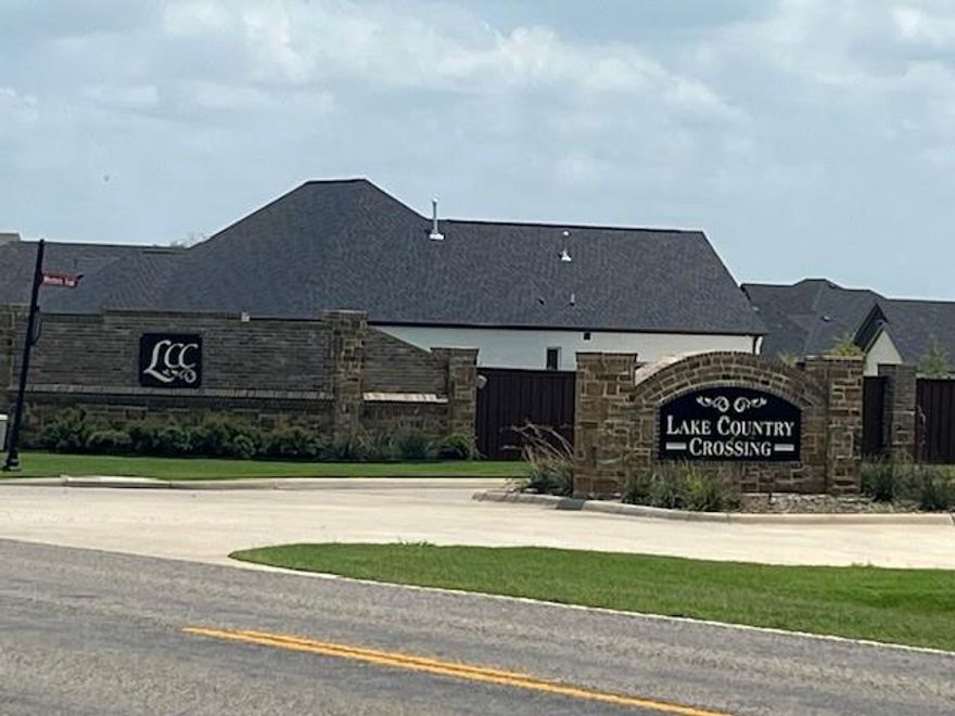Lake Country Crossing consists of 57 half acre + lots. All lots are serviced by city water and sewer. The development is accessible by two entryways and a privacy buffer on the south side of FM 120. The streets in the development are concrete with curbs and covered mailbox stations. The green space serves as a retention pond for the neighborhood. Lake Country Crossing is a unique development not often found in Grayson County - spacious lots, close proximity to local shopping and highways but with that feel of the country you've been longing to find! Just minutes from several of the top marinas on Lake Texoma - you truly have the best of all worlds! Pottsboro is served by an exemplary 3A school district and is a Go Texan certified retirement community.  This lot is already fenced on three sides, which gives the buyer a break on fencing costs! Lot 6, 100 Chisolm Trail, is on the west side at the corner of Western and Chisolm Trails.