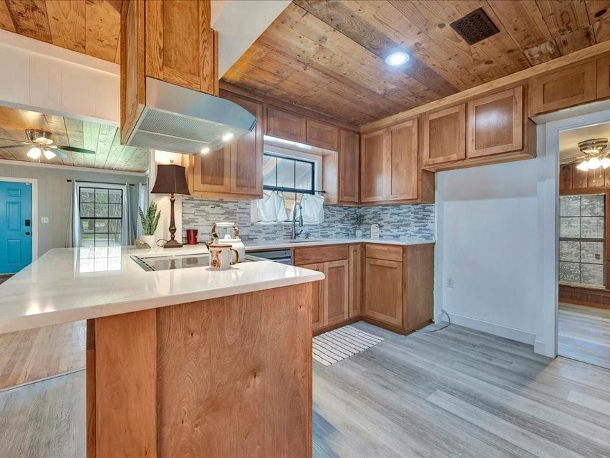 Charming and full of character, this delightful 2-bedroom, 1-bath home is a must-see! The spacious bonus room offers versatility—perfect as a 3rd bedroom, home office, or playroom. Gorgeous exposed wood ceilings add warmth and personality, while tasteful updates blend modern comfort with timeless style. The kitchen features sleek countertops, updated cabinetry, and newer appliances, and the remodeled bathroom showcases contemporary finishes. Natural light fills the cozy living spaces, creating an inviting atmosphere throughout. Enjoy a lovely yard with room to relax or garden. Whether you’re a first-time buyer, downsizing, or looking for an investment, this move-in-ready home checks all the boxes. Conveniently located near shops, dining, and parks—don’t wait to see this one!