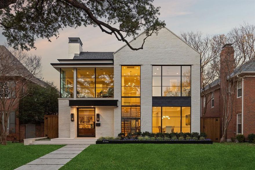 Stunning new construction in Highland Park Independent School District zoned to University Park elementary school. Prime location on a beautiful tree lined street walkable to schools and parks. This sophisticated, low maintenance design with a corner unit sliding patio door that brings in loads of natural light and combined with the motorized screens brings the outdoors in. The sleek stone exterior is enhanced by a 2-story window unit showing off the free-standing hand forged steel staircase. If you're looking for the ultimate flex space for guests you found it, this home has a 2-story guest suite with an office space on the first floor and a loft with built in cabinets and a full bath on the second floor that would act as the 6th bedroom if needed. The first floor has wide open spaces to include a nicely appointed wet bar with fridge drawers, ice maker and refrigeration that is flanked by the dining room, family room and connects seamlessly to the kitchen for entertaining ease. Waterfall island top and floating powder bath stone are like jewelry for the home. The primary suite has floor to ceiling corner windows that make the house shine. All of the secondary bedrooms have full baths and generous closets. Several rooms on the 2nd or 3rd floor can be used as game or workout spaces. Smart film on primary windows allows for ultimate privacy. Full encapsulated foam insulation and high efficiency water heaters and furnaces help this house be low maintenance. A must see in person!