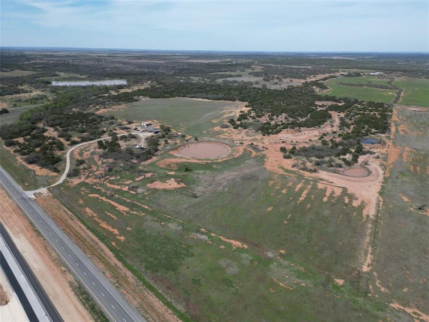 The property is approximately 172.5 acres located along US Highway 67 in Eastern Coleman County.  The property includes a mix of dryland cultivations and native pasture with a mix of hard woods, cedars, mesquites and oaks.  Mukewater Creek cuts the southwest corner of the property.
Excellent hunting opportunities with convenient access along Hwy 67.  Improvements in include a 2,040 SF cabin with 3 bedrooms and 2 bathrooms, covered porches on front and back and attached carport.  Metal shop barn with overhead door containing approximately 1,600 SF.  Large tank near cabin with 3 additional stock tanks on the property.