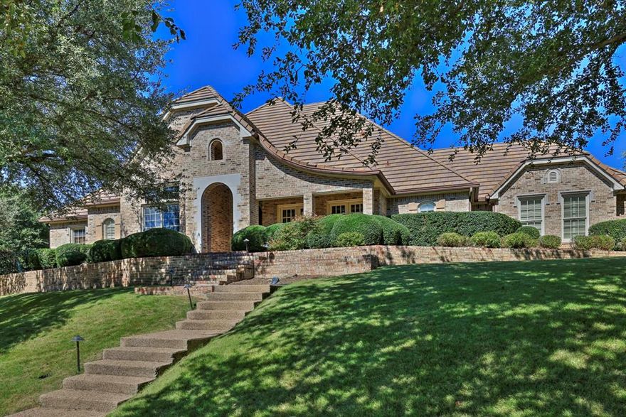 Welcome to this stunning traditional home nestled within the prestigious guarded and gated community of Mira Vista. From the moment you step inside, you’re greeted by soaring ceilings, an elegant formal dining room, and a beautifully appointed study, perfect for working from home. Designed with entertaining in mind, the open-concept layout boasts generous room sizes and effortless flow throughout the main living areas. The fully renovated kitchen is a chef’s dream, featuring custom cabinetry, quartz countertops, a large center island, double ovens, and a premium Wolf gas cooktop. The inviting living area centers around a cozy gas-log fireplace and is enhanced with built-in speakers for the ultimate entertainment experience. The spacious primary suite is conveniently located on the main level and offers wood flooring, a luxurious jetted tub, separate shower, dual vanities, and a sizable walk-in closet. Upstairs, you’ll find three additional bedrooms, each with ample closet space, and two full bathrooms. Step outside to your own private oasis with a beautifully landscaped yard, a sparkling heated pool and spa, an outdoor kitchen, and retractable electric screens for added comfort and privacy. This home is the perfect blend of timeless elegance and modern luxury.