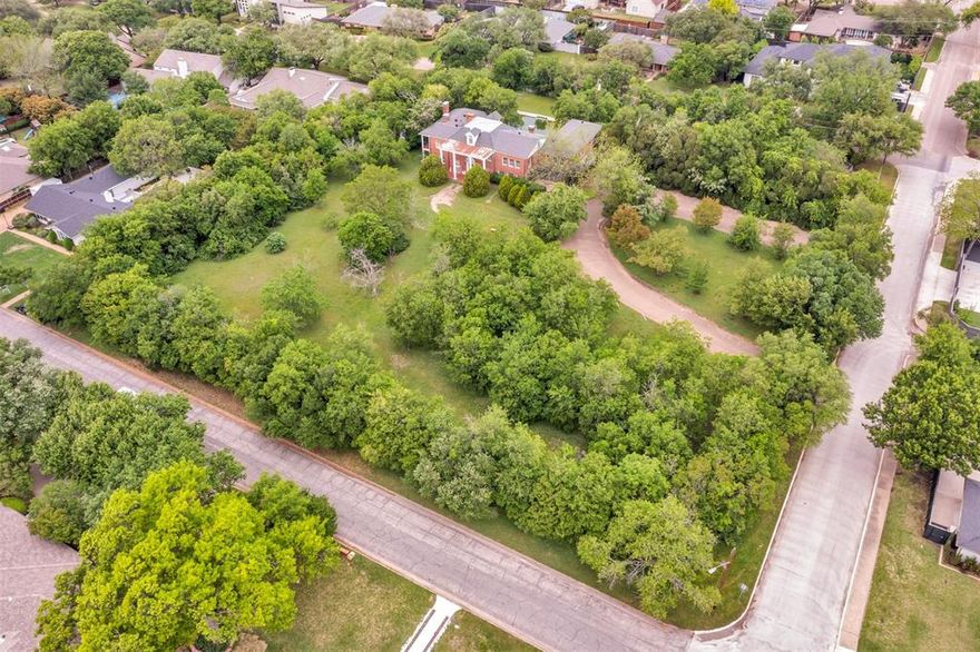 Under one address, there are two Tax IDs 00-00080-874-800-0100 and 00-00080-874-800-0000. The total sqft of land is 107,071,  2.46 acres.  the value is in the lot.