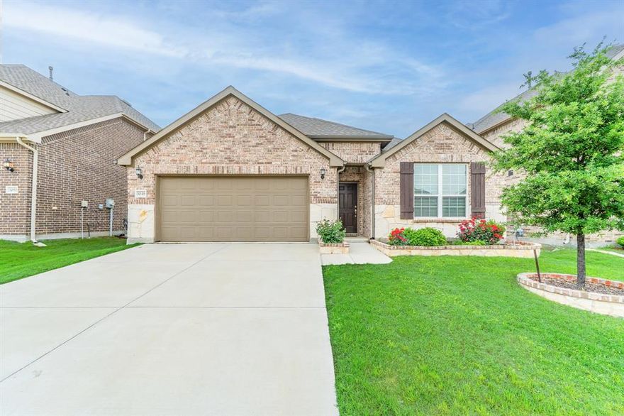 This beautifully maintained four bedroom, three bath brick offers the perfect blend of comfort, style, and convenience. Just 6 years old and in excellent condition, it’s ideally located in the North Fort Worth corridor with quick access to Interstate 35W, making commuting a breeze.
Step inside to an open, inviting floor plan designed for both everyday living and entertaining. The spacious living area features a cozy fireplace with a gas starter, while the dedicated work nook provides the perfect spot for working from home or managing daily tasks. A large separate utility room adds extra convenience and storage. The split bedroom arrangement offers privacy, with a huge primary suite serving as a true retreat. All bedrooms and living spaces are on one level, making this home as practical as it is appealing.  Outside, you’ll find a fully fenced backyard with plenty of room for pets, play, gardening or weekend gatherings. With nearby schools, shopping, dining, and all the conveniences of North Fort Worth just minutes away, this home checks all the boxes.  Seller requests proof of funds and prequalification with all offers.