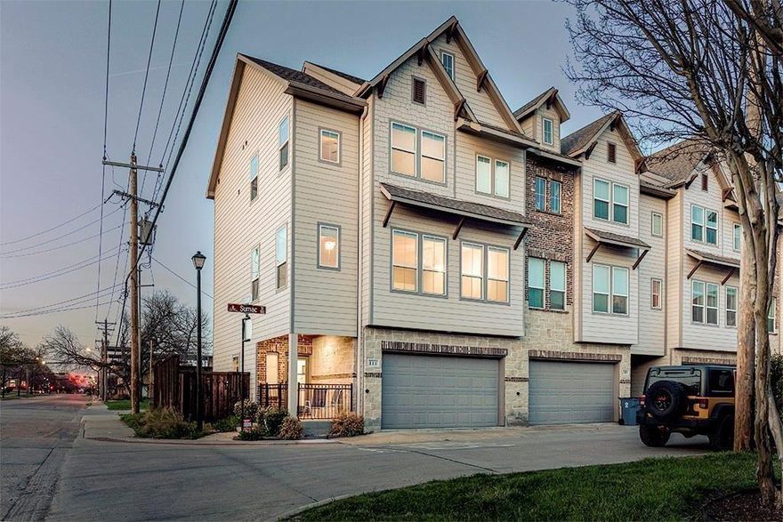 Desirable end unit 3-story townhome in the heart of Old Town Lewisville! 3 BR + Study, 3.5 Bath with an inviting front porch, covered back patio & small fenced backyard w green artificial turf!  Light & bright open plan! Wood floors! Ground floor has a welcoming Foyer & a private BR w French door to covered patio & open courtyard w green artificial turf & stained wood privacy fence! 2nd floor has open spacious kitchen w SS appls including fridge, walkin pantry, white shaker cabinets, quartz counter, and a large open living-dining space, private Study & half bath! All BRs have ensuite baths! 3rd floor features Primary BR w tiled sep shower, free-standing tub, 2 sinks & big walkin closet! There's another 3rd floor BR w full bath & WIC! Laundry closet conveniently located in hall between BRs - includes full size washer & dryer! Top down bottom up window shades! Modern living, energy-saving features! 2 car garage. Great location! Walk to shops, restaurants & concerts in the park! Lewisville ISD. Minutes to DFW Airport, easy access to I35 & Hwy 121. You'll love the walkable lifestyle!