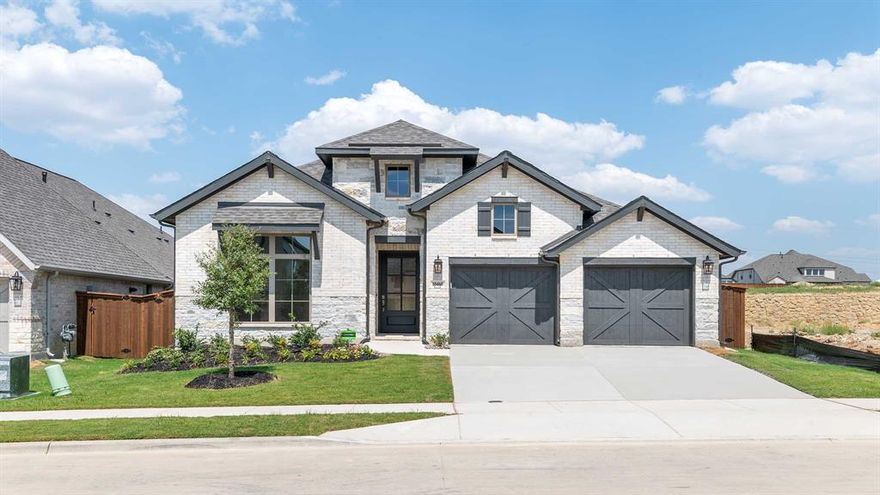 Extended entryway with 12-foot ceilings. Game room with French doors frame the entry. Spacious family room with a wood mantel fireplace and wall of windows. Open kitchen offers an island with built-in seating space and a corner walk-in pantry. Primary suite with a wall of windows. Dual vanities, garden tub, separate glass enclosed shower and two walk-in closets in the primary bath. Guest suite just off the extended entry with a full bathroom and walk-in closet. Secondary bedrooms with walk-in closets. Utility room with private access to the primary bathroom. Covered backyard patio. Mud room just off the two-car garage.