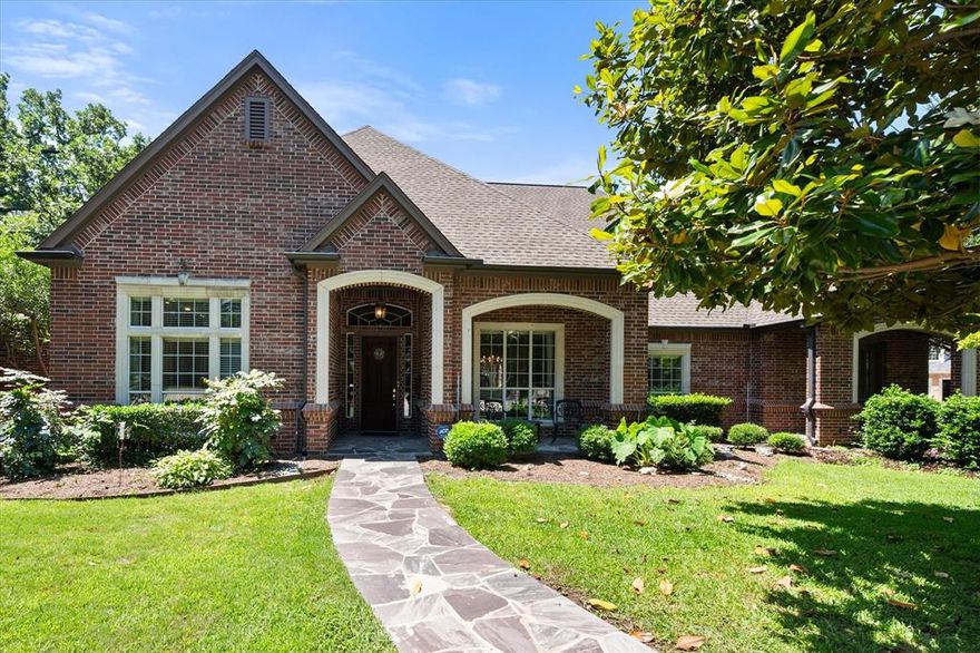 Welcome to 6100 Forest River, an exceptional luxury residence tucked inside the prestigious gated community of Riverbend Estates, complete with a private guard shack entrance for the ultimate in security and exclusivity. Designed for both elegant entertaining and everyday comfort, this stunning 3-bedroom, 2.5-bath home offers refined living with timeless finishes and impressive amenities throughout. Step inside to rich hardwood floors, soaring ceilings, and spacious living areas filled with natural light. The gourmet kitchen is beautifully appointed with granite countertops, custom cabinetry, generous prep space, and an open layout flowing seamlessly into the main living area and formal dining room—perfect for hosting intimate dinners or large gatherings alike. A private office provides the ideal work-from-home retreat or quiet study. The luxurious primary suite is designed for relaxation and accessibility, featuring a spa-inspired bath complete with a walk-in bathtub. Outside, enjoy your own private backyard oasis surrounded by an elegant brick privacy fence, lush landscaping, and a tranquil water garden that creates a peaceful resort-style atmosphere. One of the home’s most extraordinary features is the fully enclosed patio retreat, complete with a premium Hot Spring Spa hot tub, offering year-round enjoyment in total privacy. Additional updates include a new roof installed in 2020 and a new water heater in 2025, providing peace of mind for years to come. Car enthusiasts, boat owners, and hobbyists will appreciate the rare oversized 4-car garage with impressive high ceilings—perfect for car lifts, boat storage, or even a small RV. Also in the garage is a separate large closet and bathroom! This is luxury living at its finest in one of the area’s most exclusive neighborhoods. 6100 Forest River offers sophistication, privacy, and exceptional amenities in a setting that truly feels like home.