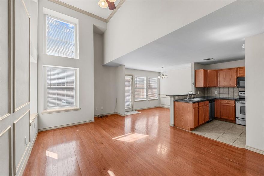 Move-in ready! Beautiful end-unit townhome located just a few minutes from the Dallas-Fort Worth International airport! Beautiful open floor plan with lovely flooring! The property offers 2 bedrooms, 2 full bathrooms, and a half bathroom. The master bedroom is huge with a large sitting area, 2 separate closets, and an ensuite bathroom! Second bathroom services just the secondary bedroom, and the guest half bathroom is downstairs.  Lots of storage space! The utility room is off the kitchen and is sufficient for a full-size washer and dryer. It has a covered porch in front and a partially covered patio in back. The private, fenced backyard is ideal for relaxing and entertaining.  This property offers easy access to numerous restaurants, entertainment, and shopping. Easy access to highways! Some photos are virtually staged. Call for more details and showing today!