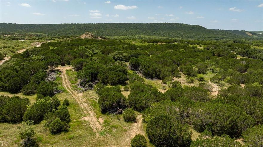 Fantastic Small Acreage Near Strawn!  Hard To Find 19 + - Acres with Incredible Views!  Amazing Sunsets!  Build Your Dream Home Here In This Peaceful Country Setting or Use as a Great Weekend Getaway!  Located 1.5 Miles South of the Strawn Exit by Ranger Hill!  Just 15 Minutes to the New Palo Pinto Mountains State Park!  Lots of Wildlife Including Deer, Turkey, Hogs, & Quail!   Electric Pole Already Set and City of Strawn Water Available!  Oaks, Mesquite, and Cedars! New Fencing on 2 Sides!  Ag Exempt! Enjoy The Peaceful Country Living!  No HOA, Not in a Subdivision!!! Just Raw Undeveloped Land!  35 Minutes to Weatherford OR 35 Minutes to Stephenville!  Located right on Highway 16 South of Strawn.  Please do not use Google Map for directions because Google isn't accurate.  Follow directions per MLS listing or contact owner agent.