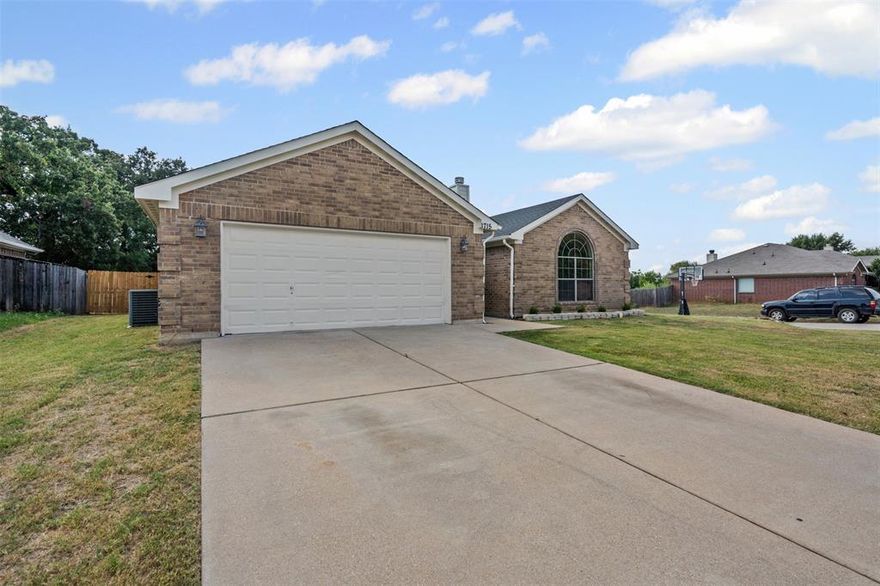 Welcome to this beautifully renovated 4-bedroom, 2-bath home designed with comfort and style in mind. The open floor plan creates a natural flow throughout the home with the heart being the spacious living room and eat-in kitchen, making it ideal for both gatherings and everyday living. A cozy fireplace anchors the living room, adding warmth and charm. The primary suite is a true retreat, featuring a spa-like bath with a garden tub, dual vanities, and a separate shower for ultimate convenience. Every detail of this home has been thoughtfully updated, giving it fresh, move-in-ready appeal. With no one living behind you, the outside boasts a generously sized yard which offers plenty of space for gardening, entertaining, or play. Blending modern updates with timeless comfort, this home is ready to welcome its next owner.