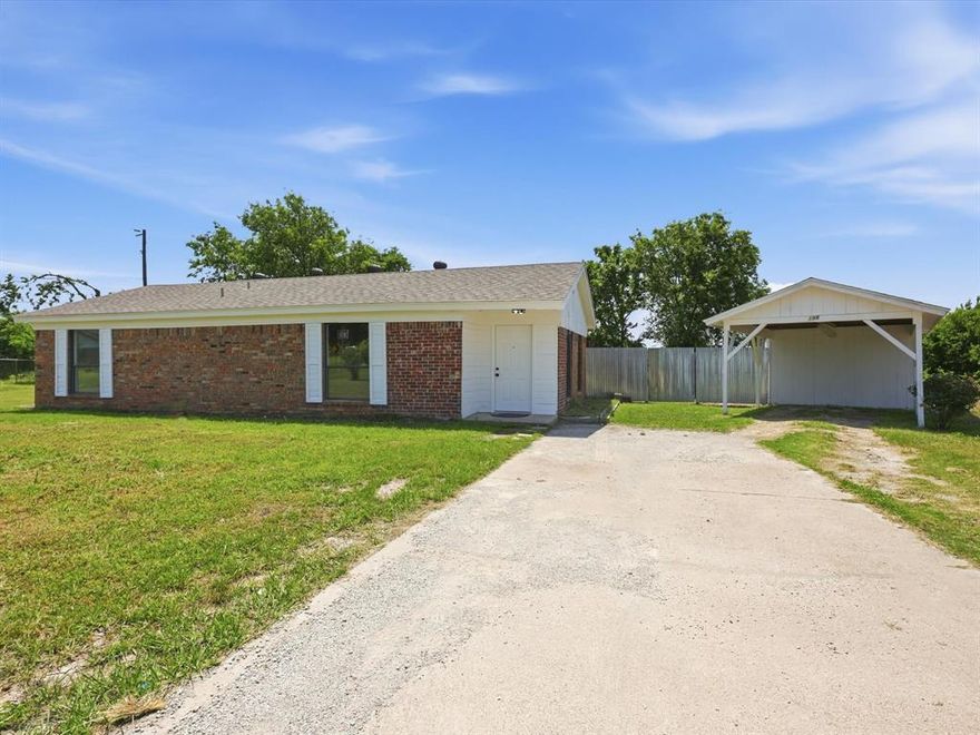 Beautifully updated 2-bedroom, 1-bath home situated on a spacious oversized lot, offering the perfect blend of comfort and style. The open-concept layout creates a seamless flow between the inviting living area and the eat-in kitchen, featuring stunning quartz countertops, a farmhouse sink, and ample cabinetry for storage. Both bedrooms are generously sized and include walk-in closets, providing plenty of room for everyday living. Enjoy the expansive outdoor space - ideal for relaxing, entertaining, or future possibilities. Recent updates include new flooring, tub, shower tile, electrical and plumbing fixtures, and a thermostat.
