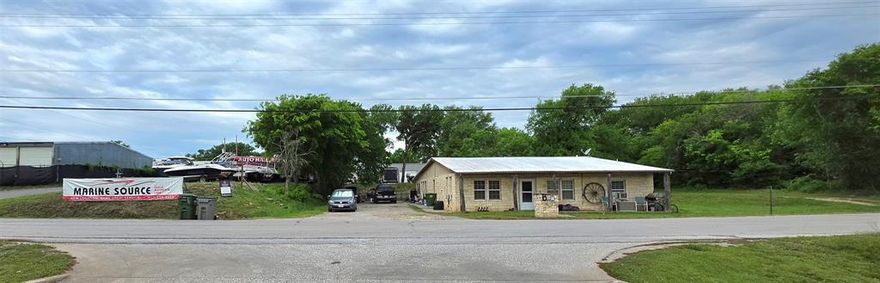 Income-producing duplex AND 5000SF warehouse on nearly 1 acre just minutes from Eagle Mountain Lake. Originally constructed in 1945, the property has been adapted for income use and is currently fully leased, providing immediate cash flow. The duplex offers approximately ±2,800 SF (buyer to verify) and benefits from a private, low-density setting with convenient access to Boat Club Road and surrounding growth corridors.

Positioned within unincorporated Tarrant County, the property offers flexibility with limited zoning restrictions compared to incorporated areas. This asset is ideal for investors seeking stable residential income with upside potential through rent growth or future redevelopment.

This property is also listed with 9381 Live Oak Lane and the 5000+sf industrial bay building behind the duplex. See MLS#21224626