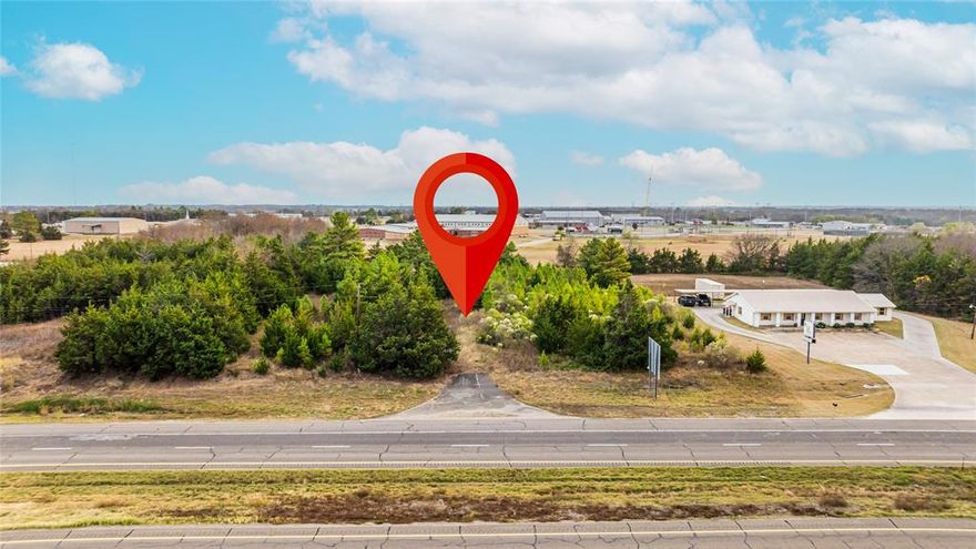 Exposure, exposure, exposure! If exceptional visibility and accessibility are your priorities, this property is ideal. Situated on the bustling Loop 286 in Paris, TX, is this 1.43-acre site.  The size, shape, road frontage and topography allow for a variety of uses. Located along a four-lane divided highway(Loop), conveniently situated between two crossovers, ap. 150' away, facilitating easy access from either direction. Utilities are already in place, enabling you to commence your project without delay. Neighboring properties include the Farm Bureau Insurance to the west, the entrance to Chisum ISD and CEFCO Truck Stop to the east, and the entrance to the Amazon Warehouse to the north.