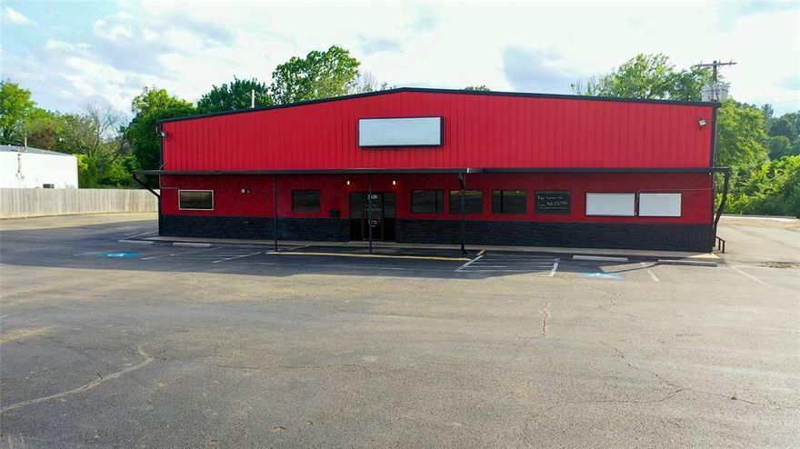 Prime Commercial Property Off Loop 286 For Sale in Paris TX

This prime commercial property spans 10,400 square feet and sits on a 1.13 acre lot, offering generous space and flexibility for a variety of business opportunities. Located on a well-traveled highway with approximately 30,000 vehicles passing daily, this property enjoys exceptional visibility, making it an ideal location for businesses looking to attract high traffic and maximize exposure. 

The entire lot is completely paved, providing ample parking for employees, customers, or clients, and the spacious interior is ready to accommodate a variety of commercial uses. Whether you're considering a retail store, office space, or light industrial use, the building's high ceilings and large windows offer a bright and inviting atmosphere.

Currently, the property is leased for one year and one month, offering an established income stream. With its high visibility and prime location, this property presents a strong investment opportunity.