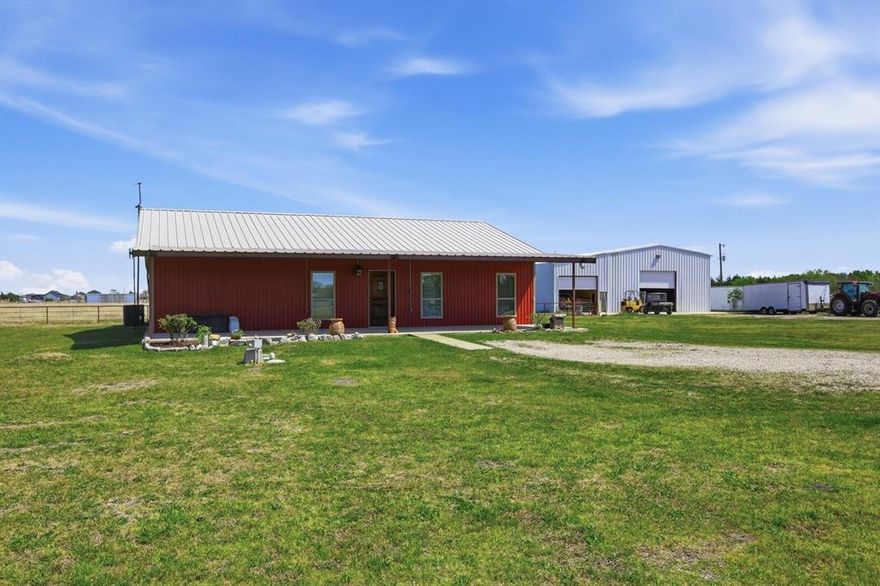 Enjoy the perfect blend of peaceful country living and functional acreage on this 21.295-acre property located outside city limits in highly sought-after Palmer ISD. With wide open space, a private pond stocked with bass and bluegill, and room to grow, this property offers endless potential for those looking to escape the city while staying within reach of Waxahachie conveniences.
The 2,000 sq ft custom-built home (2014) features an open-concept layout with energy-efficient closed cell spray foam insulation. The kitchen is designed for functionality with a large island, double sinks, and ample cabinet space. The primary suite includes a walk-in shower, garden tub, and spacious layout for comfort. Additional features include a tankless water heater, propane setup and a dedicated laundry room with sink.
Outside, the property offers a large shop structure and a secondary barndo space, providing flexibility for storage, projects, or future improvements. There is a storm shelter in the house. The land is level with expansive views, a pond approximately 10–12 feet deep, and plenty of room for livestock, recreation, or building out your vision.
If you’re looking for acreage, privacy, and the opportunity to make a property your own, this is one you won’t want to miss.