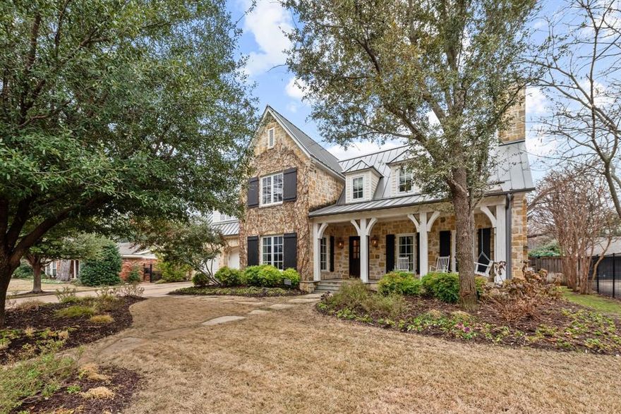 Welcome to 4217 Glenwood Drive, a custom-design and build masterpiece by HGC. This elegant home offers 4 bedrooms, 4.5 bathrooms, and a wealth of high-quality features. Upon entry, a formal panelled study and gracious dining room with picture window set the tone for refined living. The large kitchen boasts chef-grade stainless steel appliances, a butler's pantry, and custom cabinetry. The great room features vaulted ceilings, stained beams, and a wood or gas burning fireplace with a stone chimney. The exterior exudes hill country charm with a stone façade with metal roof, the stone front porch has cedar beams, a custom mahogany door, and gas lanterns and stone pavers. The large back porch includes a stone fireplace. The primary bedroom, located on the main level, offers a private retreat with his and hers walk-in closets. With a prime location near Tanglewood Elementary and Tanglewood Park, this home presents an incredible opportunity to experience the best of Fort Worth living.