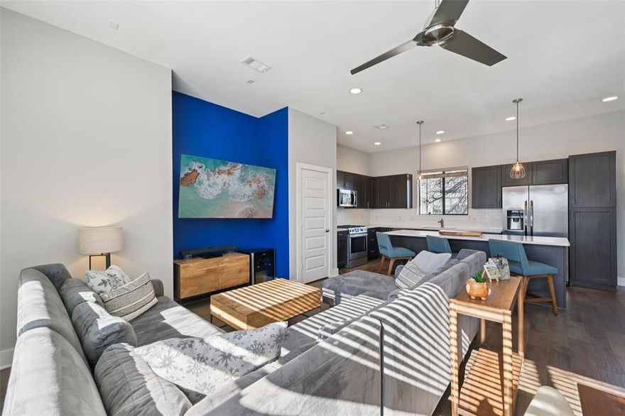 Want to wake up in a room with a view? If you seek the Dallas skyline, search no further than 4407 Munger Avenue #2. This multi-level condominium in the Old East Dallas area near Henderson Avenue - Lower Greenville, offers views of the Dallas skyline from multiple floors.  The large rooftop terrace is decked out with lighting and equipped with gas and water making it ready for you to entertain under the stars. The open floor plan on the second level floods with natural daylight. The oversized island is a great space for in-kitchen dining or entertaining. It has ample seating for four, a built-in beverage refrigerator & added storage. The Bosch 5-burner, gas range with convection oven makes it easy for the chef in you to prepare a culinary feast for family and friends. The property offers 2 bedrooms with en-suite baths, a half bath on the second floor, outdoor living areas on the rooftop and on the ground level, both equipped with water and gas so you can grill or garden with ease. The condo does not have carpet, so it is allergen friendly with hardwoods and tile. The primary suite boasts 2 walk-in closets as well as a linen closet and a Juliet balcony to take in the views. The guest room has a Murphy bed with shelving which makes the room flexible for work at home office space. The attached 2 car garage has shelving & additional storage areas along with a work space for projects or plants. One of four residences in this intimate community, this transitional style unit offers urban living with panoramic views of downtown but without the traffic congestion of city living. The property is conveniently located on the Baylor Hospital grid, so you won’t lose power when you need it the most. Jimmy’s Food Store, St. Martin’s Wine Bistro, E Bar Tex-Mex, Loro Asian Smokehouse & Bar as well as a variety of retail are blocks from this property. Less than 1 mile to the Rustic and Uptown. Rooftop views, great location, lock & leave, ready for you to call 4407 Munger Ave #2 home.