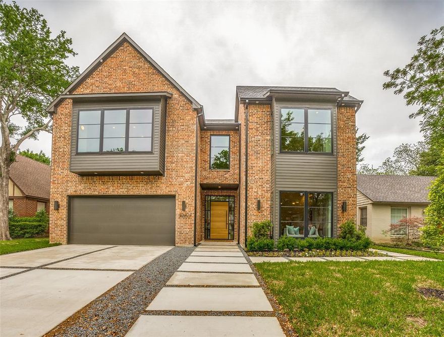 The 5,326 square-foot, two-story house features five bedrooms and five and a half bathrooms, with a sumptuous master bath that feels like a spa. There is a game room, and an extra flex room, a neighborhood rarity, that could serve as an extra office, a gym, or an art room, all created with one of Dallas's best interior design firms, Layered Dimensions. The spacious contemporary kitchen is overflowing with amenities, special touches, and sophisticated detailing, including a large island, a chic vent hood, and a variety of custom extras, a hallmark of Santa Barbara Homes. Located in Lakewood’s stately C Streets near lovely White Rock Lake, the community is decidedly upscale dotted with manicured lawns and live oaks, plus easy access to restaurants, recreation, and transportation arteries. The home is just a few blocks from a state-of-the-art YMCA, and near Lindsley Park, a secret gem of a green space, perfect to enjoy with families seeking the luxurious lifestyle they richly deserve.