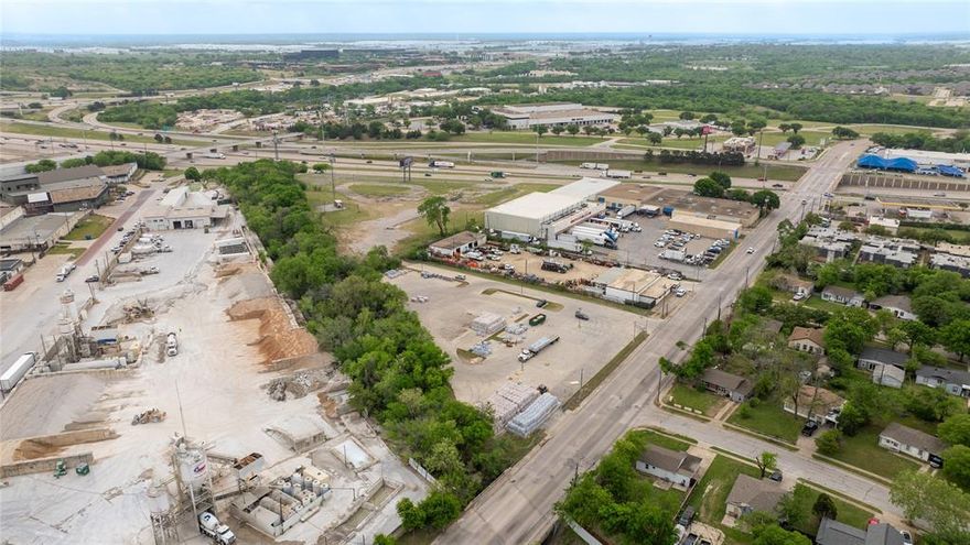 Prime commercial opportunity offering two parcels totaling approximately 7.498 acres, ideally positioned with high-visibility highway frontage along SW Loop 820 and additional access from Hemphill Street. This property is zoned for warehouse use, making it well-suited for distribution, storage, or light industrial development.

The site includes two separate parcels of 5.60 acres and 1.898 acres, providing flexibility for phased development, multiple uses, or investment strategies. Dual access points enhance traffic flow and logistics efficiency—an exceptional advantage for commercial operations.

Utilities are already in place, with water and electricity installed, reducing upfront development costs and accelerating project timelines. The strategic location offers excellent connectivity to major thoroughfares, ensuring convenient access for transportation and business operations.

This is a rare opportunity to secure a sizable, well-located commercial tract in a rapidly growing area with strong demand for warehouse and industrial space.