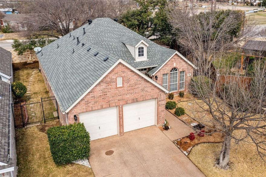 Multiple offers. Highest and Best due Sunday 3-13 at 8 pm. Wonderfully updated garden home in the desirable Bridgeton on the Creek. The wood like tile floors are throughout the house except the bedrooms. The kitchen is centrally located in the home and it's a great entertaining spot with a built in wine cooler in one of the two islands. The fireplace is in the living room with gas logs. The master bedroom features a soaking tub and separate shower and is split from the secondary bedrooms so there is privacy between the rooms. The backyard features a custom built pergola with a sprinkler system in the front and back yard. A bonus perk is that the HOA maintains the front yard.