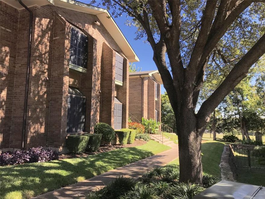 Discover this stunning, recently renovated spacious first-floor condo that perfectly combines comfort and style. Enjoy an open, flowing layout complemented by a charming covered outdoor patio and a semi-private backyard, ideal for relaxation and entertaining. The modern kitchen features new cabinets, elegant quartz countertops, and top-of-the-line stainless steel appliances, modern lighting and fixtures. Beautiful laminate wood flooring adds warmth throughout. The condo offers fully updated bathrooms, sizeable bedrooms with generous closet space, and abundant storage options, including a convenient exterior storage closet. The lease includes water, trash, and HOA fees, providing hassle-free living. Residents can indulge in fantastic community amenities such as a sparkling pool, and have direct access to Stevens Park Golf Course for active outdoor fun. Parking is a breeze with one covered and one open space. Ideally located near downtown, Bishop Arts District, and Stevens Park Golf Course, this move-in-ready home is waiting for you to make it yours.