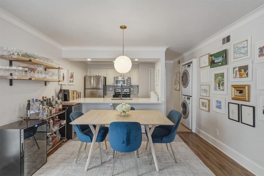 This charming, second story condo has been tastefully updated & is move-in ready! Complete with two ample-sized bedrooms & two full bathrooms, it's perfect for your next home or investment property. Walk into an open concept floorplan with a dining space & vast living room overlooking a coveted covered balcony. The kitchen includes stainless steel appliances, granite countertops, & updated tile backsplash. Additional highlights include a stackable Washer-Dryer area, updated flooring, ample storage, new windows in the bedrooms, new lighting fixtures & ceiling fans, & fresh paint throughout! Enjoy a resort-style pool & outdoor cabanas within this gated community. Unit comes with two assigned covered parking spaces. Enjoy convenient access to 75, SMU, Central Market, White Rock Bike Trail, & some of Dallas' top restaurants & retail!