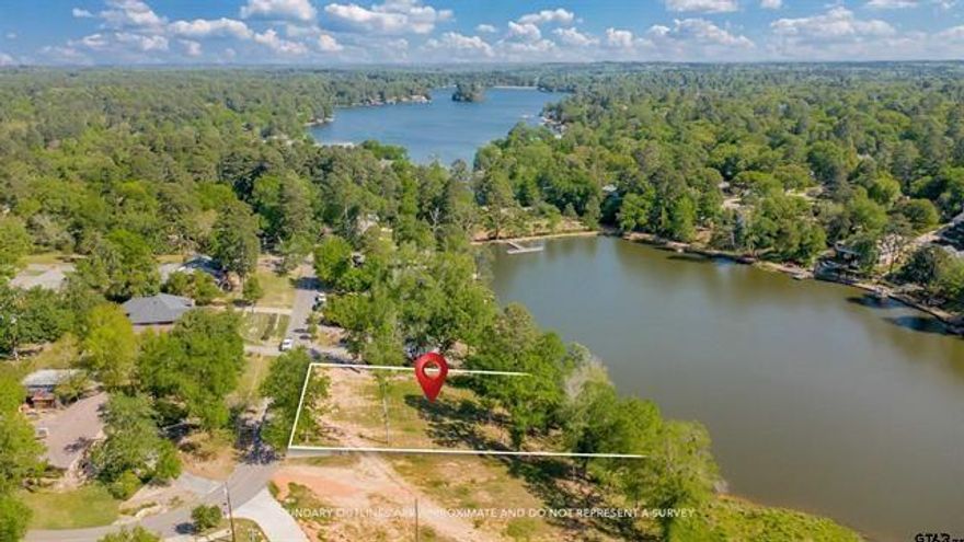 Beautiful waterfront lot located on the quiet, highly desirable Golden Pond in the sought-after Hideaway Lake community of East Texas. This exceptional property offers serene water views and a peaceful setting, making it the perfect place to build your dream home or weekend retreat. Positioned along one of Hideaway’s most tranquil fishing lakes, this lot provides a rare opportunity to enjoy true waterfront living. Imagine designing your home to take full advantage of the calming lake views, morning sunrises over the water, and the gentle sounds of nature right outside your door. Whether you enjoy fishing, kayaking, or simply relaxing by the water, Golden Pond offers a quiet escape from the everyday. Living in Hideaway Lake means enjoying a private, gated, resort-style community with outstanding amenities. Residents have access to 27 holes of golf, three larger lakes for boating and recreation, parks and walking areas, a clubhouse with dining, swimming pool, tennis and pickleball courts, and a full calendar of community events. With 24-hour security and a welcoming atmosphere, Hideaway offers a lifestyle that blends relaxation, recreation, and natural beauty. Whether you're looking to build a full-time residence or a peaceful getaway, this waterfront lot on Golden Pond is a rare opportunity to create something truly special in one of East Texas’ most desirable communities.