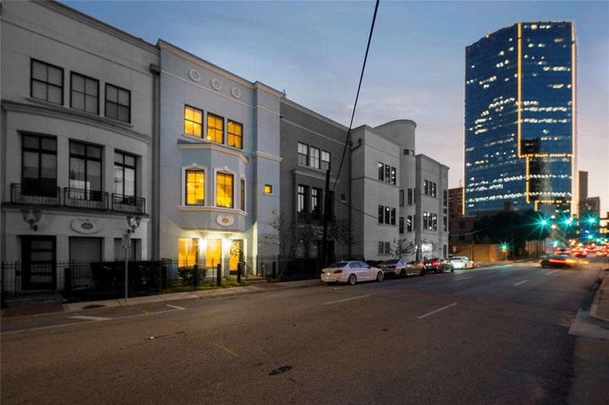 Beautiful rooftop views, abundancy of living space, excellent walkability score.  Located at 6th and Jones, this townhome sits just three blocks from Sundance Square, Bass Hall, numerous high end dining establishments, and I35W for very fast highway access.  Nail down hardwoods, granite counters, plantation shutters, are just a few of the amenities and upgrades featured on this hard to find property. Separated into three main floors, ground floor features two car garage, laundry, first elevator access, office or bedroom or living room, full bathroom, tons of storage. Second floor features family room, kitchen, dining, half bath, and storage.  Third floor features two additional bedrooms with en-suite bathrooms, storage.  Top floor is roof access with expansive views of downtown.  These homes do not come available very often, don't miss the chance to secure a desirable, and perfectly located townhome in Downtown Fort Worth.