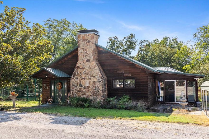 Nestled in one of the original developments on picturesque Lake Brownwood, this home beautifully combines old world charm and privacy with modern comforts and amenities, making it an ideal escape for those seeking tranquility and adventure. Situated on nearly half an acre, the property offers ample space to accommodate all your needs, including covered metal storage for your boat and a spacious garage for all your lake toys. Recent upgrades enhance its appeal, featuring a new dishwasher, new oven, and a new reverse osmosis system for convenient living. A private lake pier, just a short stroll away, is exclusively yours, providing endless opportunities for lakefront relaxation and fun. Inside this expansive home featuring four bedrooms and two bathrooms. The impressive living room is a focal point, boasting a stunning fireplace that enhances the log cabin style ambiance, perfect for cozy family gatherings. The generously sized dining room is versatile enough to accommodate a pool table, catering to both dining and entertainment needs. The unique layout includes a loft style bedroom upstairs, complete with a deck offering serene lake views. Extras include Hot tub for ultimate relaxation. Two new sliders leading to the sunroom and a new full glass backdoor with built in blinds, letting in plenty of natural light. A new sunroom back door enhances accessibility. Recent servicing includes an 1800 gallon pump out, ensuring the home's efficiency. Enjoy the beauty of three pecan trees surrounded by full rod iron fencing, ideal for privacy and aesthetics. The property is adorned with lush Saint Augustine grass, creating a vibrant and inviting outdoor space. This home also features an indoor outdoor living area, creatively utilized as a greenhouse and spa, providing a sanctuary for nature lovers and relaxation seekers alike.  Located near the dam in the desirable Kirkland Lakehaven area.