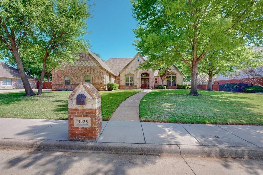 Luxury at its finest in the exclusive gated community of The Waterfront near Eagle Mountain Lake. This beautifully designed, one-story Mediterranean inspired custom home sits on a spacious half-acre lot and offers high-end finishes and thoughtful upgrades throughout.
Features include 4 bedrooms, 3 full bathrooms, 1 half bath, a dedicated home office, and a sun-filled rotunda style living room. The open floorplan is ideal for entertaining, showcasing Mediterranean-inspired architectural details such as custom pillars, custom wood cabinetry and enclosed wine storage.
The chef’s kitchen is a true showpiece with:
• Double ovens
• Two dishwashers
• Two sinks
• Breakfast bar and island
• Custom wood cabinetry with glass inserts
• Stainless steel appliances
• Desk space
• Pot filler
• Walk-in pantry
• 3-car garage with lift to attic storage
• Large laundry room with sink and built-in cabinets
• Close proximity to dining and shopping on Boat Club Road
Enjoy the outdoors with a covered patio, outdoor kitchen, TV, and hot tub—perfect for entertaining or relaxing.
This one-of-a-kind property is a rare find—schedule your showing today!
*2.75% VA assumable loan available. 
*All information deemed reliable but not guaranteed. Buyer's agent to verify all information.