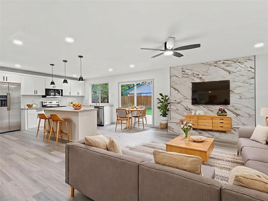 WOW! SOD & LANDSCAPING PACKAGE for buyer with accepted offer  of 5K!!!  You won’t want to miss this completely renovated home—updated from top to bottom. The open floor plan creates a seamless flow, while sophisticated finishes set a modern tone. A stunning accent wall becomes the focal point of the living area, and abundant natural light fills every corner, making the space feel bright, warm, and inviting. Behind the beauty, the big-ticket updates have already been handled: enjoy year-round comfort with a brand-new HVAC system and peace of mind with 47 piers of professional foundation reinforcement. Style, strength, and comfort—all wrapped into one move-in ready home.

At the heart of the home is a chef’s dream kitchen. This gourmet space blends style and function with sleek, granite countertops, custom cabinetry, designer hardware, and brand-new stainless steel appliances. A spacious center island with bar seating invites friends and family to gather, while modern pendant lighting sets an upscale tone. Ample storage and a thoughtfully planned layout make this kitchen as practical as it is luxurious. Brand new refrigerator just installed! 

The primary owner’s suite is a private retreat, featuring a spa-like bath with a sleek walk-in shower, and modern fixtures. The calming aesthetics make it the perfect place to unwind.

Outside, the possibilities are endless. The expansive ~8,000 sq. ft. lot is ideal for a lush garden, play area, or entertaining paradise—with plenty of space for a storage shed, outdoor kitchen, or even a sparkling pool. 

Don't miss your chance to own this luxurious retreat! Perfectly positioned near premier shopping, dining, and everyday conveniences, this home keeps you close to everything you love. Choice of schools and a wide choice of nearby amenities make it as practical as it is desirable—bringing style, comfort, and location together in one irresistible package.