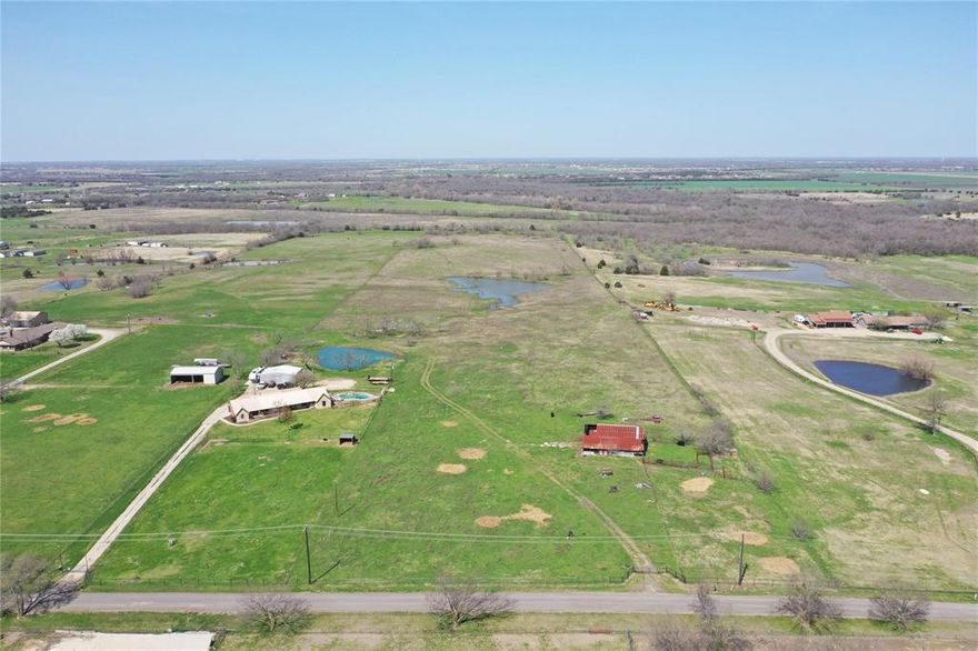 Prime 25.3 acres in the fast-growing Royse City corridor with water and sewer at the street and excellent access to I-30 and Buc-ee’s. This versatile property is AG-exempt, outside the ETJ, and has no floodplain, offering fewer restrictions and maximum flexibility for development. — whether you’re looking to build your dream ranch, family compound, or a small residential community. Fully fenced with a gorgeous stock pond & barn. Ideal for 2–5 acre homesites, acreage lot subdivision, residential community, or long-term investment hold in a high-growth area.  Conveniently located just 30 minutes to Downtown Dallas and 15 minutes to Rockwall, this tract offers both immediate usability and future development potential. Additional acreage available (up to 51+ acres total) Opportunities like this don’t come around often — call today to walk the land and explore the possibilities! FLEXIBLE TERMS! Seller can OFFER OWNER FINANCING with two-thirds down, balance by seller.