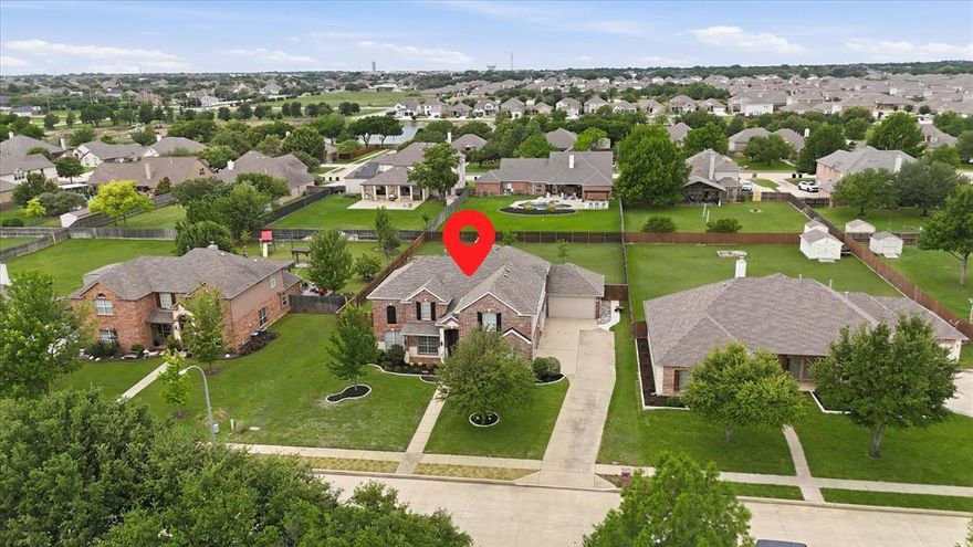 Gorgeous EAST facing 5 bedroom on a sprawling .459 acre estate homesite in the heart of sought after Sendera Ranch!  Enjoy resort living at the private backyard outdoor oasis which includes a low maintenance recently built 2023 sparkling pool, spacious covered patio & beautiful landscape.  4 car garage!  Wide open floor plan with soaring ceilings, primary retreat, study plus guest suite down, 3 spacious bedrooms plus game room & fully equipped media room: screen, projector, media chairs & speakers, on second floor!  Huge gourmet chef's kitchen with refrigerator, double ovens, gas cooking & loads of granite counter space.  The primary retreat has french doors that open to the outdoor oasis.  Located in the highly acclaimed Northwest ISD.  Community amenities:  multiple pools, walking trails, parks, basketball, greenbelts & playgrounds.  Just minutes to 287, 114, 35W, Alliance Airport, DFW Airport, Alliance Town Center, Tanger Outlets, dining, shopping & much more.  This home is immaculate and move-in ready.  See it today!