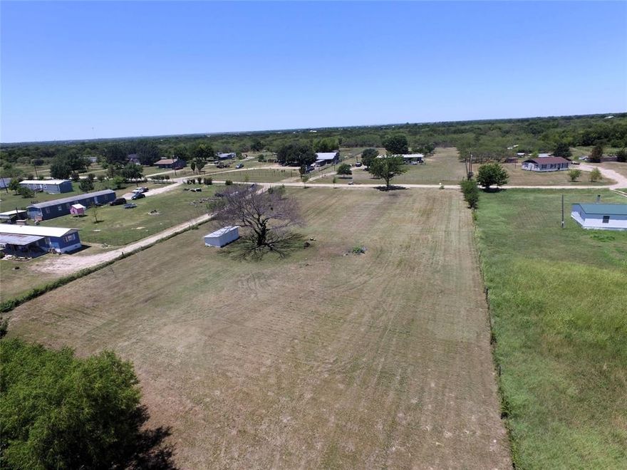 Beautiful unrestricted 2+ acres in a very peaceful area with a pond nestled among trees in the back. The front is cleared and ready to build. There is electricity and a shed already in place. Great access to I-30 for a commute in to Dallas or just off Highway 276 into Rockwall. Royse City is a fast growing area with all the shopping, reastraunts and schools with more growth coming. This property will still be out of the city to keep the quite country feel!  Very nice custom homes are going up and sprawled out just around the corner. This property does allow manufactured, modular and site built. No known restrictions. Just need septic and water tap. Come and make this 2 acres your family home with your very own pond!