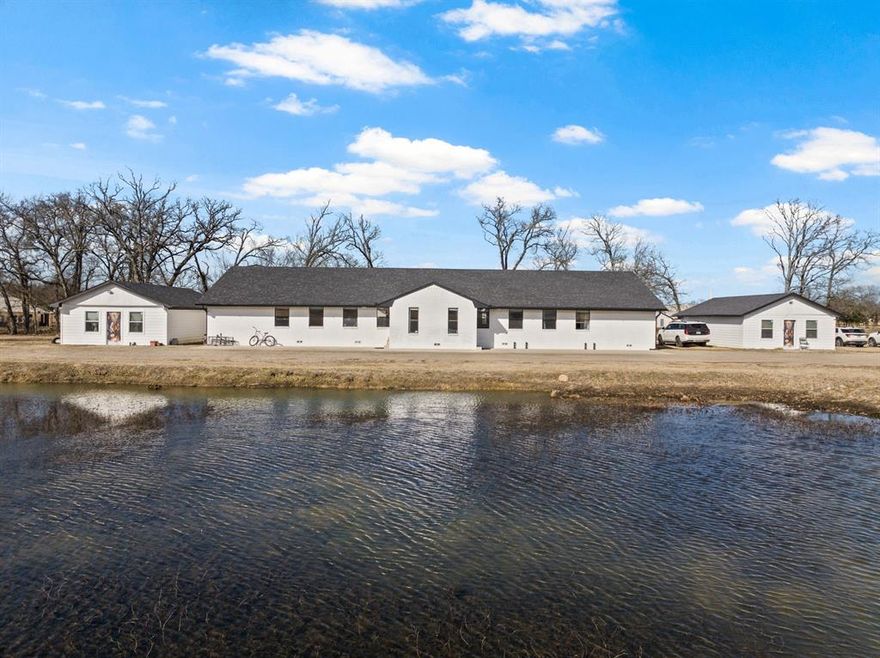 Are you looking for a property that offers the potential for multi family, multi generational living or the opportunity to add to your rental portfolio? This property has all of that. Welcome to this 6 bedroom 4 bath main house that also has 2 separate apartment-retreat style dwellings. The main house has had numerous updates to include HVAC, flooring, roof, paint, cabinets, appliances, bathrooms, fixtures and more. As you enter the home you will be welcomed by the oversize living and dining area. Adjacent to them is the well accompanied kitchen that boast a large island with a farm style sink and dish washer. On the backside of the kitchen you will be excited to see the commercial grade gas range and oven with 2 refrigerators. Off the living area are 2 sides that both have 3 bedrooms and 2 baths each. There is a master suite on each side with updated tile bathrooms. Additionally on the outside you will find 2 more dwellings that could be used for a retreat, office space or rental income. They each have 960 sq. ft. of space including 4 shower stalls, 4 toilet stalls and sinks as well. These dwellings are each cooled with a mini split. The property is large enough that you could raise a garden and even raise small animals. Come check out this property that offers a variety of opportunities.