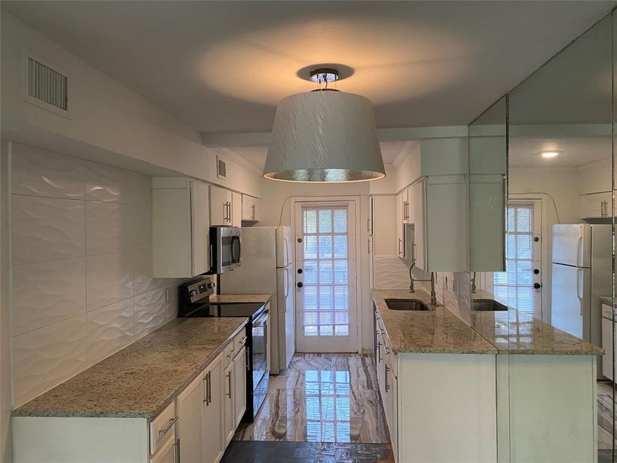 GREAT LOCATION!! Beautifully remodeled in 2024. 2 larger bedrooms and 2 full baths. Kitchen has new appliances and new granite countertops. Extra cabinets added and wall removed to open up Kitchen to Living area. ALL OLD TEXTURE REMOVED and Architectural 5. Flat, No texture on walls and ceilings. New flooring throughout. Porcelain agate tile, Frisee carpet. New designer ceiling fans and light fixtures. 2nd floor unit with indoor corridor for extra safety. Refrigerator and washer, dryer come with unit. 2 assigned parking spots in front of the unit's door. Balcony patio just outside the back door outside of the kitchen. Unit is in a quiet part of the complex, in the back. Large pool on property.
  LOCATION IS BY GALLERIA, 635, Tollway. VERY CENTRALLY LOCATED!! 

*Onsite, for showing, park in space #62 in front of the building door.