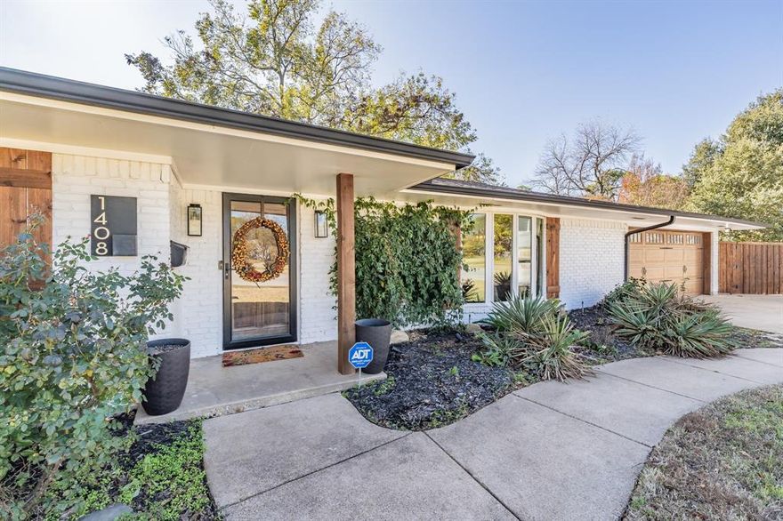 Beautifully updated home in the heart of the metroplex in North Arlington perfectly situated at the end of a cul-de-sac.  This spacious three bedroom partially furnished home features two living areas a large dining room with great flow ideal for entertaining or comfortable everyday living. The generous kitchen has been updated with quartz countertops, refreshed cabinetry, tile floors, and stainless steel appliances. Neutral laminate flooring runs throughout the home creating a clean and cohesive look. The large primary bedroom includes an en-suite bathroom and walk-in closet with plenty of space for a sitting area. One secondary bedroom features a built-in Murphy bed, maximizing space and versatility. The oversized backyard is perfect for gatherings, complete with a paved patio ready for barbecues and outdoor entertaining. A 16x20 workshop with electricity and water provides endless possibilities ideal for a man-cave, she-shed, studio, or hobby space. Two additional storage sheds offer even more convenience. A utility closet with stackable washer & dryer right next to mudroom & garage for convenience. Refrigerator, Washer, and Dryer will remain.  Located just south of I30, this home offers quick access to highways, shopping, dining and the Arlington entertainment district.