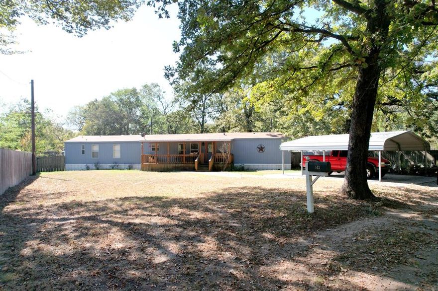 HERE IS AN AFFORDABLE LAKE AREA HOME! Located just around the corner from the public boat ramp on 515 E, this home is fisherman friendly! Carport for your boat, small yard for little maintenance to not interrupt your fishing time! 3 bedroom, 2 bath manufactured home is sitting in its original location since purchased new and should be eligible for FHA, USDA fin'a'ncing. Exterior features a 9x28 covered front porch, a 9x36 covered back porch, a 9x13 rear open deck-sitting area and a wood fenced yard. This would be a great weekend home, or downsize to something smaller, that you can handle on you own. Bring your best offer, motivated seller is ready for your offer! Buyer to verify any and all information.
