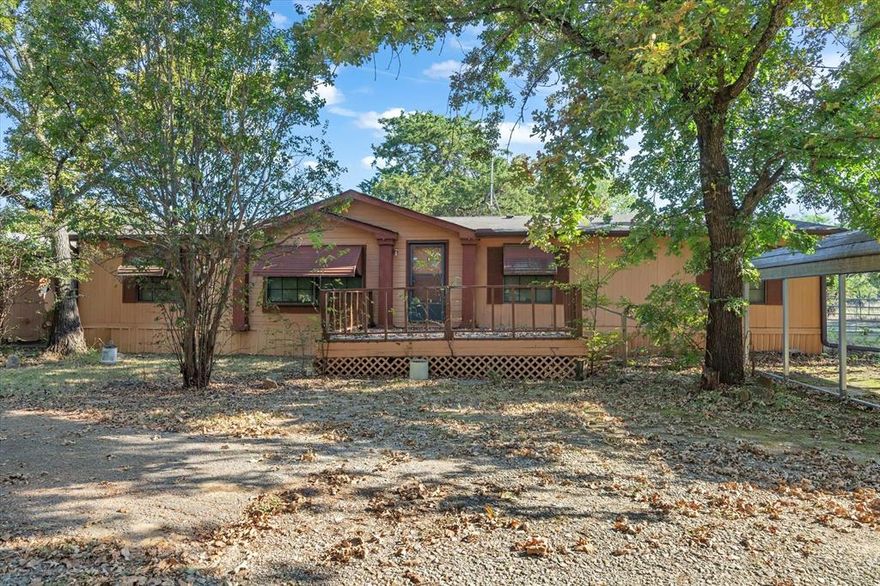 Room to Grow and Play on 1.61 Acres
Welcome home to this spacious 3 bedroom, 2 bath property nestled on 1.61 peaceful acres in a quiet country neighborhood. With two comfortable living areas that open to the kitchen, there’s plenty of room for family gatherings, movie nights, and weekend entertaining. The primary suite offers a relaxing escape with a garden tub and separate shower, while two additional bedrooms provide great space for kids, guests, or a home office.

Outside, the fenced yard gives children and pets room to explore safely among scattered, mature trees. Enjoy the convenience of a 2-car garage, plus front and back carports for extra parking. A pole barn and tornado shelter add practical value for busy families. Located in highly rated Wills Point ISD and just a short drive from town, this property combines country living with family-friendly comfort and convenience.