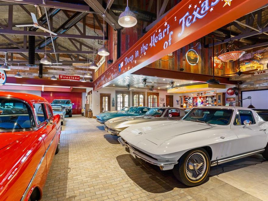 You have NEVER seen anything quite like this in McKinney, TX! The 6215sf showroom was constructed from a 100yo barn and features a soda shop counter. This space is fully air-conditioned and heated, and is attached to the main house. If you're not a car enthusiast, this space has a TON of potential to become your ideal escape! Think Pickleball, Basketball, Multi-Generational Living, the sky is the limit!!  Paradise Ranch is a stunning Tuscan-style estate. This exquisite 12,501 sf home boasts 4 bedrooms, 6 bathrooms, a workout room, a theater, and an indoor-outdoor pool! All of this is on 10.6 acres with a 4-stall barn. The property features rustic facades, gracefully-arched doorways, and a blend of Old World charm with modern sophistication. Enjoy beautifully landscaped grounds, a partially treed lot, and a private gated entrance. Ideal for those seeking luxury and tranquility, this estate offers an unparalleled living experience. Don't miss this unique opportunity to own a piece of Paradise Ranch!
