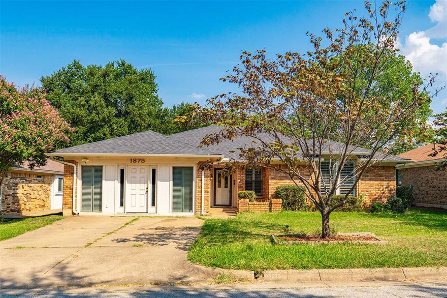 PERFECT LOCATION! This lovely home is only a short walk to the coveted Hill Elementary and the Duncan Robinson Park! A delightfully peaceful neighborhood for any family with plenty of great features. Just over 10 minutes to the AT&T Stadium and downtown Arlington area and just over 20 minutes to downtown Fort Worth! This beautiful home welcomes you into the spacious living room with wood-burning fireplace and vaulted ceilings! The living room opens right to the dining room and kitchen! Kitchen has granite counters, a brand-new dishwasher, and recently purchased oven-stovetop, along with a cute corner window that looks out over the large backyard! Just past the dining room and through the full-size laundry room there is an extra-large room that can be used as a great second living area or easily be used as a spacious 4th bedroom as well! On the other side of the house is the primary suite with large ensuite bathroom! This bathroom has two big walk-in closets, a long double-sink vanity, a great soaking tub, and a newly tiled shower! The other two bedrooms have a fun passthrough between them that can easily have doors added or be walled up for more privacy. Plus, this home has a wonderful covered back patio with tons of space for entertaining or just relaxing in the back while overlooking the large yard! BRAND NEW ROOF INSTALLED EARLIER THIS YEAR!! Come by and take a look today!