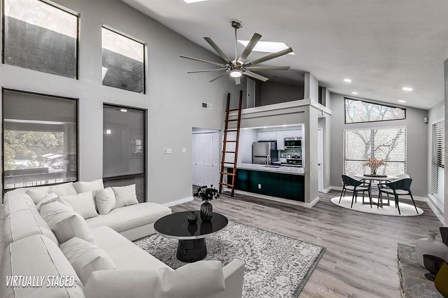 NEW PRICE!  Don't miss this one!  BEAUTIFUL, Creatively redesigned and remodeled with modern style. Beautiful 2nd floor condo (1BD 1BA), spacious floor plan with balcony just off the dining room overlooking the greenbelt. Over sized living room and dining room tastefully painted. Open kitchen has stainless appliances, painted and updated cabinets, open quartz countertop bar. Large, walk-in shower and dual sinks. Storage throughout, recessed lighting, new engineered flooring. Light and bright designer finishes throughout. Large private balcony, fantastic area for your pets in the large open green space just a short walk away. Reserved parking space close to unit (covered F6). HOA maintains the grounds, including the gated entry, pool, & common areas. Located in a highly desirable location of Dallas. SOPAC bike trail just steps away. Close to DT DALLAS, North Park Mall, and Top Golf. HOA Fee includes water, sewer, trash.