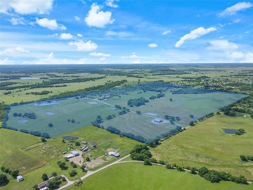 La Vista Ranch is a rare place to enjoy upscale country life. Two homes sit on 161 acres just 44 miles from Dallas and 108 miles from Waco. The property is fenced and cross-fenced for horses and livestock. The 3,919 sq. ft. 3BR 3B main house has hand-scraped floors in the huge great room with wood ceiling accents, a floor to ceiling stone fireplace and attached studio quarters. Enjoy sunrise and sunset on one of the patios. The 2,768 sq. ft. 4BR 3B house has a flagstone back patio and upstairs balcony to view the lake. A large shop-hay barn, 2 horse barns (1 with a bunk house), 1 lake, 6 ponds, a lighted outdoor arena and round pen are on the property. There is numerous wildlife on the property and great fishing for the outdoorsman. This property truly has it all.  Make your dreams come true!
Seller to convey all minerals owned, if any.