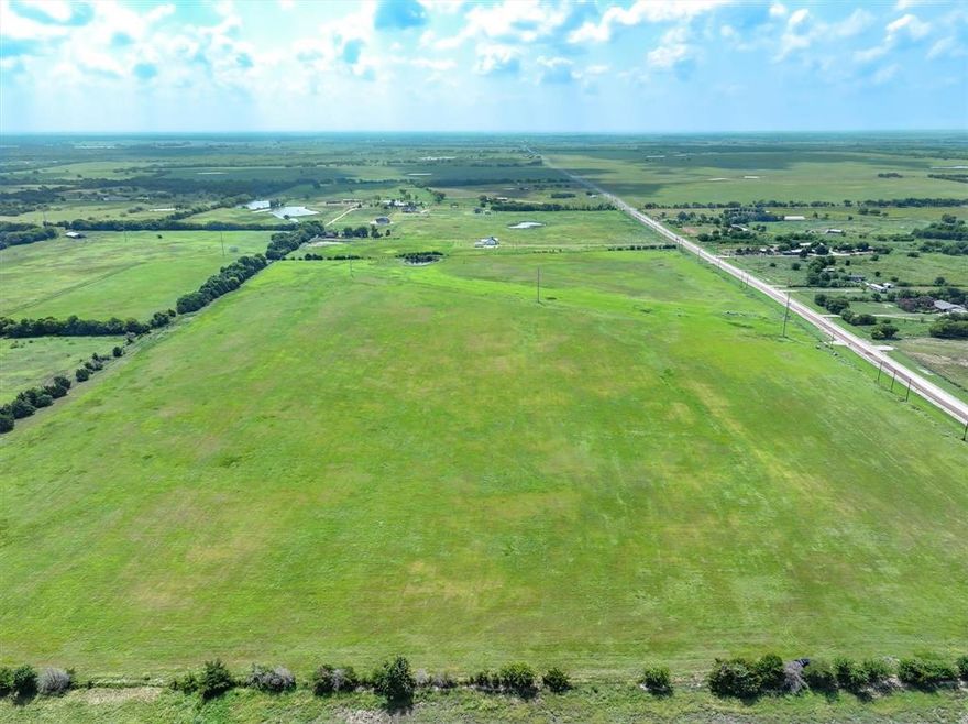 Rare opportunity to own 11.28 (+ or -)  acre lot to build out your forever ranchette.  There are 4 to choose from and located in the Poetry area which has developed into a sought after community half way between I 30 and I 20 convienent for commuters or trips to the airport.  These lots were thought out and divided with care to include a house and 1 acre plus 10 for an agricultural use if desired.   The property is currently under hay production.  The sellers have already surveyed out 4 large lots to choose from and water, electric are available at the road for each lot. We have included a virtual example of what your vision might look like on lots 1-4.  Now is the time to make it yours, call for more information.  Septic required for each lot bring your builder take a look!  Photos with homes and buildings have been virtually displayed and do not exist to easier visualize the properties possibilities.