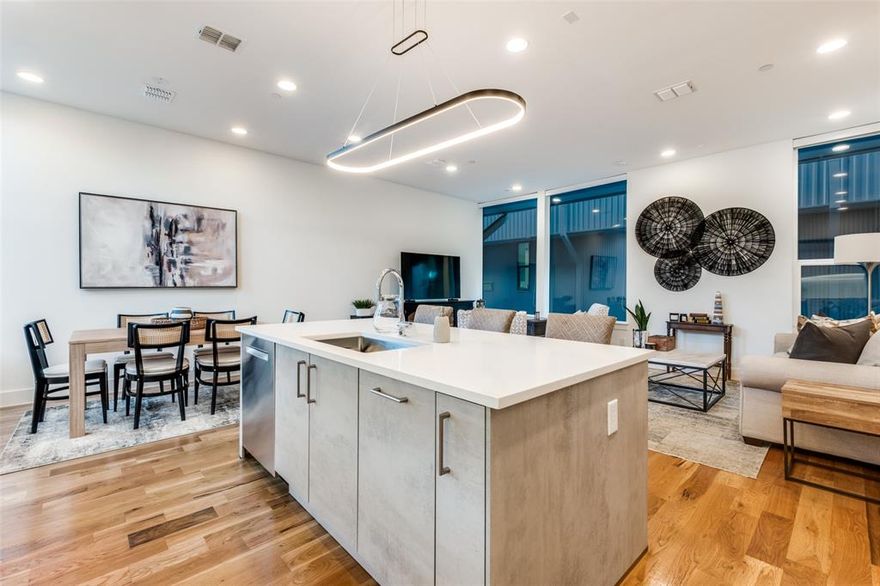 Investment Opportunity! Experience upscale urban living in this 2-bedroom, 2.5-bath townhome designed by award-winning architects Far + Dang and built by Cobalt Homes. Located in a secure gated community, this home showcases clean, modern finishes and exceptional craftsmanship throughout.

Enjoy Downtown Dallas skyline views from your private rooftop deck, plus access to a community dog park for added convenience. The interior features solid-oak nail-down hardwood floors, quartz countertops, and premium Bosch appliances. The Nobilia German cabinetry with soft-close hinges, high ceilings, and smart home technology elevate the home’s modern appeal.

Additional highlights include a tankless water heater, EV charging outlet, and a two-car garage. Ideally located just five minutes from Lower Greenville, Henderson Avenue, Uptown, and Knox Street. Walking distance to Fitzhugh and Ross.