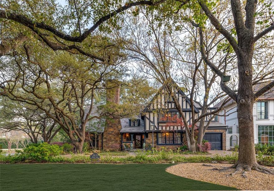 3635 Beverly Drive, one of the iconic Grandes Dames of Highland Park, was designed and built by famed architect Anton Korn as his personal home in 1925.  The current family has owned the home since 1964 and has kept it as painstakingly close to its original design as possible.  At the corner of Beverly and Drexel, and overlooking Hackberry Creek, this home is a commanding presence on its heavily treed lot.  Updated in 1946, by Earl Hart Miller, the home has one of the most magnificent  and memorable great rooms in DFW.  The 2 story room has 20 foot stained glass windows at the east end, a cozy alcove with fireplace and a massive beamed ceiling with timbers from the Oriental Hotel in 1924 downtown Dallas.  A 2nd floor landing overlooks the room with a view of the timbered ceiling.  A large formal dining room, kitchen, breakfast room, den and enclosed patio complete the 1st level with a full and half bath.  The 2nd level features 3 bedrooms and 3 full baths while the 3rd level has 2 bedrooms and 1 full bath.  The current owners added an elevator, front garage, breakfast room and enclosed sunroom, all in keeping with the original design.  This home represents a rare opportunity to preserve a truly historic home in Highland Park.