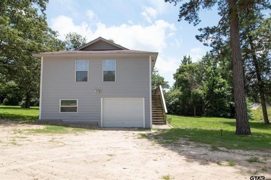 3.14 Acres Welcome you to this charming 2-bedroom, 1-bath home  * 852 sq ft house on over 3 total acres of land  *  additional 852 sq. ft. finish -ready lower level  *  shop or building pad on property, back acreage  *  development or recreation side property acreage  *  covered carport and RV storage with hookups  *  country living 30 minutes from major retail.