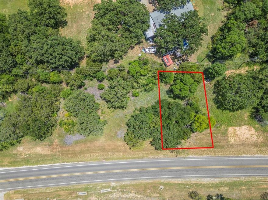 Prime Vacant Lot in Arrowhead Shores, Granbury, TX. Discover the perfect canvas for your vision in the Arrowhead Shores subdivision, a serene lakeside community nestled along the western shores of beautiful Lake Granbury. This vacant lot offers unparalleled access to Hood County's premier recreational haven, just minutes from downtown Granbury's charming shops, dining, and historic square. Whether you're dreaming of a custom-built retreat, a cozy mobile home, or an investment gem, this versatile parcel welcomes it all – mobile homes and new construction are enthusiastically allowed! Imagine lazy summer days on the water, weekend barbecues at the community pool, or watching sunsets over the Brazos River from your new backyard. This isn't just land – it's your gateway to Texas lake life, backed by a welcoming neighborhood that's been a local favorite since the 1970s. Lots like this move fast in this growing area, so don't wait!