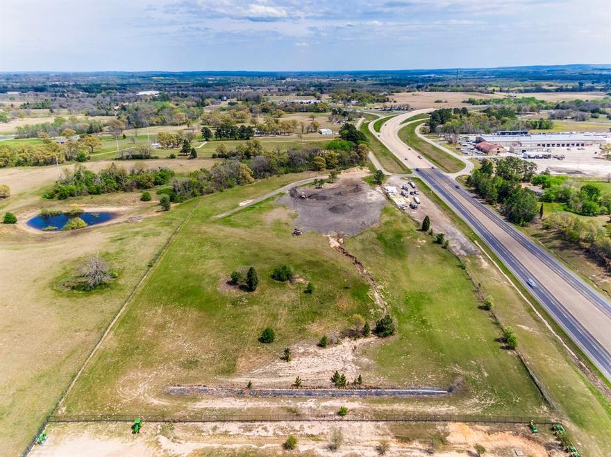 7.155 acres of prime commercial real estate with approved plat and zoning for mini storage units.