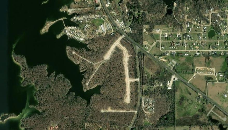 Three Lots for One!
This is an invitation to a way of life, not just land. Set along the shores of the renowned Lake Fork and tucked away among the stunning East Texas Pines, this 1.39-acre waterfront property provides the ideal balance of adventure and tranquility.
Imagine creating your dream residence on a gorgeous hilltop property, then riding a golf cart down to your private waterfront peninsula, where you may construct a fishing pier and boathouse—all on your shoreline! At this cost, you won't find private waterfront access this great!

This unique opportunity, which is situated in one of Lake Fork's newest gated communities, The Point at Fisherman's Bay, consists of three distinct lots:

Lot 14 a 0.70-acre lot ideal for your dream home, and Lot 14A, a 0.52-acre waterfront lot reserved for your private boat dock and exceptional access to the lake is provided by a private waterfront peninsula property. 
In addition, 14B-0.17 acre satellite waterfront lot reserved for your own boat dock with golf cart-only access.

Lake Fork is renowned for its record-breaking bass fishing. In addition, the neighborhood offers contemporary amenities including electricity, water, and fast internet. Whether you're looking for a weekend getaway or a permanent lakefront residence, this property is a fantastic investment because it has no construction deadline and you may select your own builder. Note : its owned by realtor.